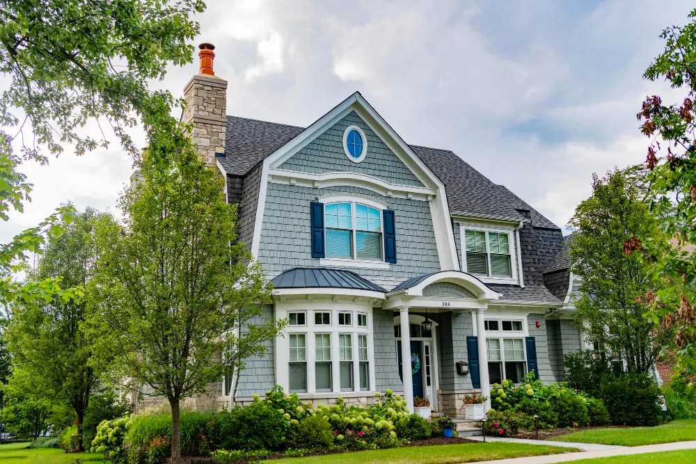 Elegant two-storey home surrounded by a leafy garden